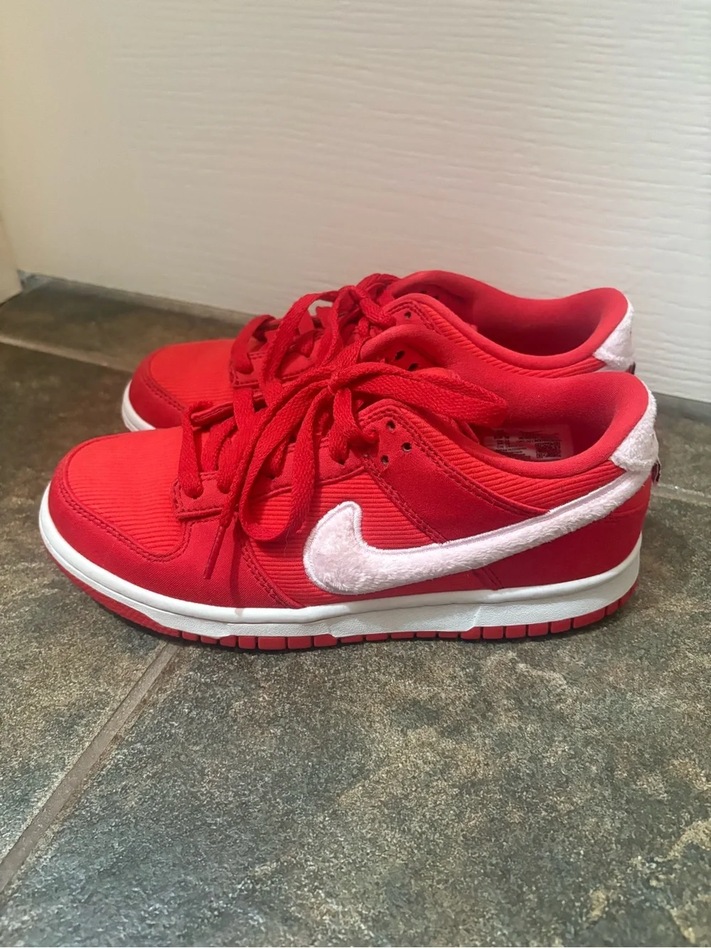 Nike Kids Red Low-Top Sneakers with White Swoosh Accent